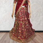 This exquisite red lehenga choli crafted from luxurious raw silk showcases intricate resham, zardosi, beads, sequins, and cut dana floral embroidery. The heavily embellished hemline and delicate cream butti accents enhance its sophisticated charm. Complete with a matching embroidered net dupatta featuring floral buttis and an elegant border, and a stitched blouse piece adorned with coordinating floral motifs, for wedding and bridal, pakistani, bangladeshi, indian, sri lankan.