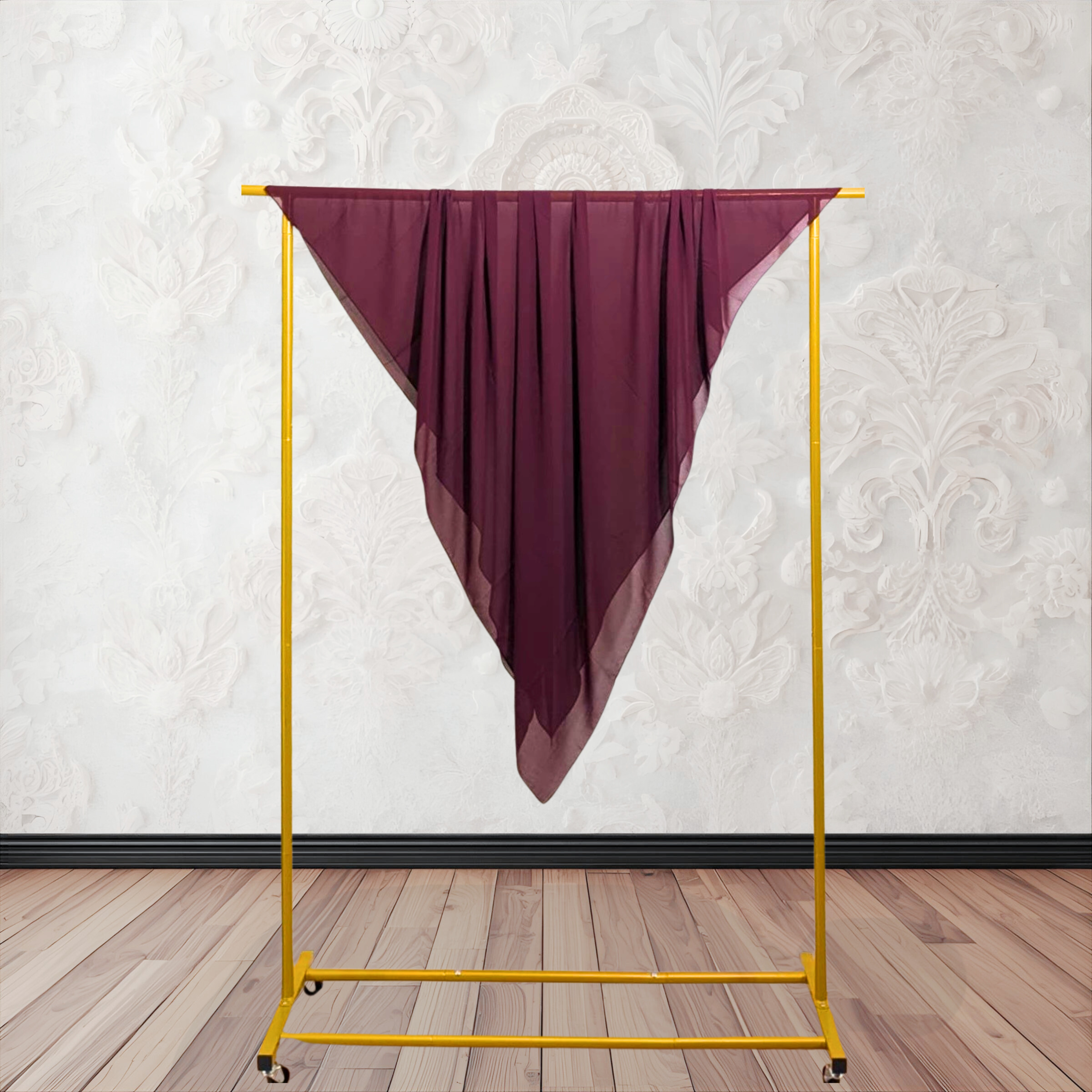 coffee color fabric draped over a yellow garment rack against a white wall.