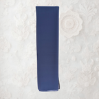 Blue napkin on a textured white surface