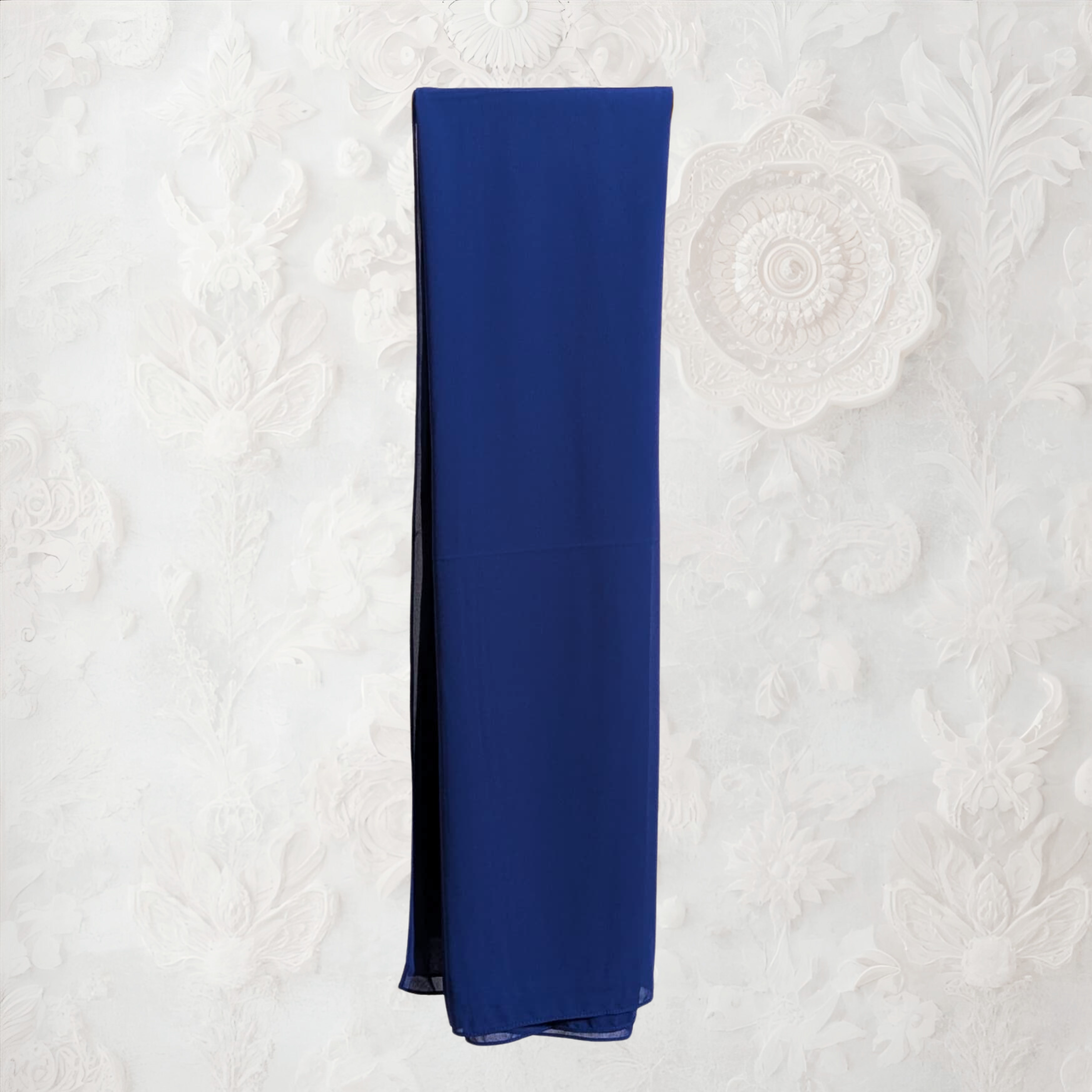 Blue fabric on a textured white background