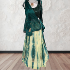 Green embroidered garment with a white floral design on a textured white background