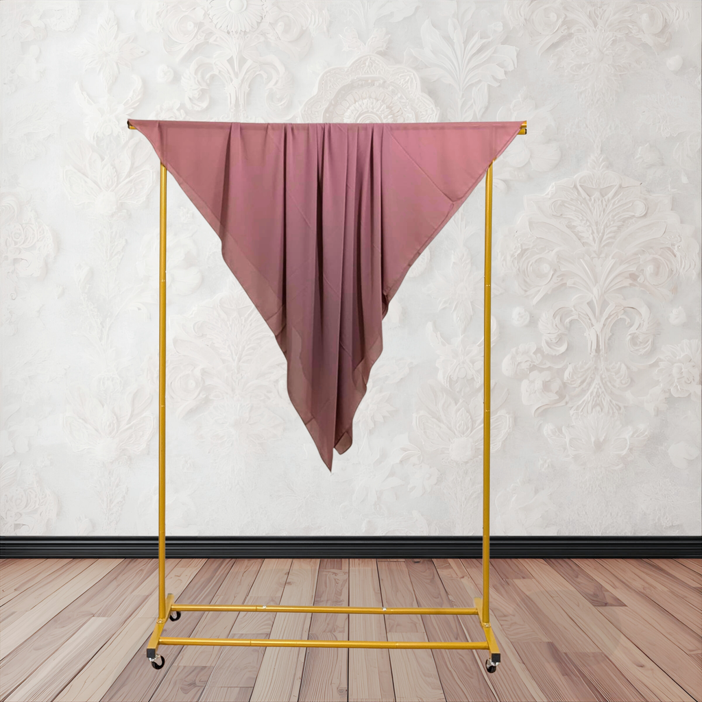 Folded pink fabric on a textured white background chiffon hijab